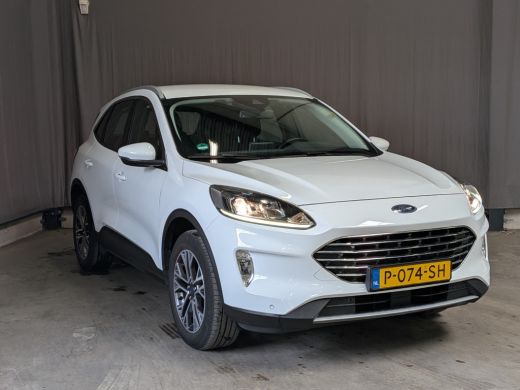 Ford Kuga 2.5 PHEV Titanium | NL-AUTO! | 1E EIGENAAR! | ELEKTR. TREKHAAK | WINTERPACK | CAMERA | PARK SENS ... ActivLease financial lease