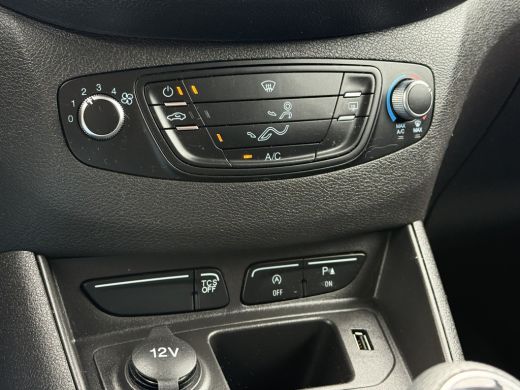 Ford Transit Courier 1.5 TDCI / 1e EIGENAAR / 23.338 KM!! / AIRCO / PDC / NAVI / DAB ActivLease financial lease