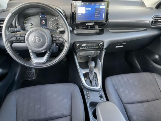 Toyota Yaris 1.5 Hybrid 115 Active | Parkeersensoren | Stoel- + stuurverwarming | Carplay | Licht metalen velg... ActivLease financial lease
