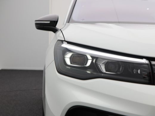 Volkswagen Tiguan 1.5 eHybrid 272 Pk Automaat R-Line Edition | Black Style | Panoramadak | Stoelverwarming | Trekha... ActivLease financial lease