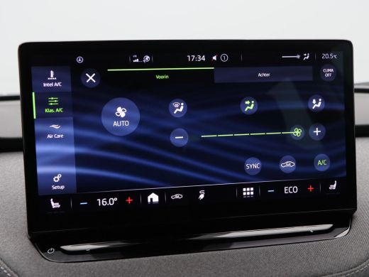 Skoda Enyaq iV 60 180 Pk | Stoelverwarming | Trekhaak | Navigatie | Cruise Control | CarPlay | Climatronic | Cam... ActivLease financial lease