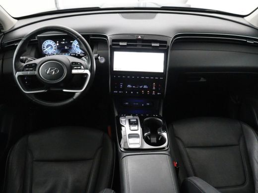 Hyundai Tucson 1.6 T-GDI PHEV Premium 4WD | SOH 96,5% | Stoelventilatie | Leder | Trekhaak | 360 Camera | Adapti... ActivLease financial lease