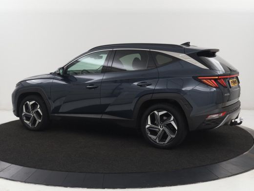 Hyundai Tucson 1.6 T-GDI PHEV Premium 4WD | SOH 96,5% | Stoelventilatie | Leder | Trekhaak | 360 Camera | Adapti... ActivLease financial lease