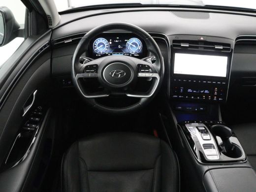 Hyundai Tucson 1.6 T-GDI PHEV Premium 4WD | SOH 96,5% | Stoelventilatie | Leder | Trekhaak | 360 Camera | Adapti... ActivLease financial lease