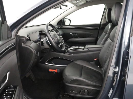 Hyundai Tucson 1.6 T-GDI PHEV Premium 4WD | SOH 96,5% | Stoelventilatie | Leder | Trekhaak | 360 Camera | Adapti... ActivLease financial lease