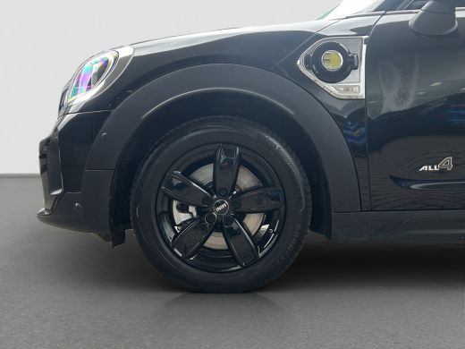 Mini Countryman 1.5 Cooper S E ALL4 Chili 224pk | Pano | Leder | Adap. Cruise | Stoelverwarming | Camera ActivLease financial lease