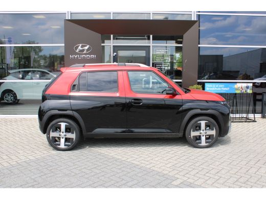Hyundai Inster Evolve Sky 49 kWh | Tweekleurig| Glazen dak | Stoelverwarming | Warmtepomp | Stuurwielverwarming ... ActivLease financial lease