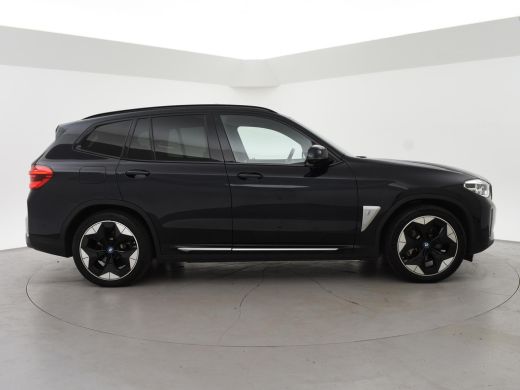 BMW iX3 HIGH EXECUTIVE 80 kWh + TREKHAAK | PANORAMA | 360 CAMERA | ADAPTIVE CRUISE | SFEERVERLICHTING ActivLease financial lease