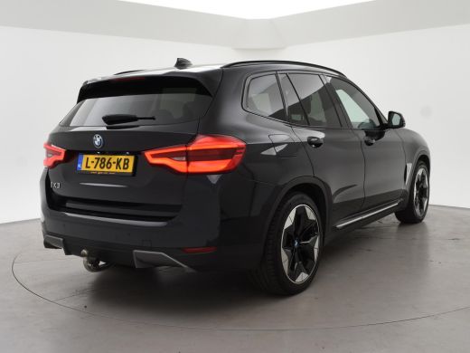 BMW iX3 HIGH EXECUTIVE 80 kWh + TREKHAAK | PANORAMA | 360 CAMERA | ADAPTIVE CRUISE | SFEERVERLICHTING ActivLease financial lease