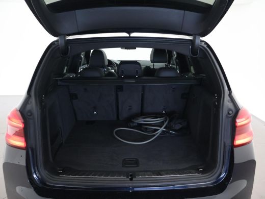 BMW iX3 HIGH EXECUTIVE 80 kWh + TREKHAAK | PANORAMA | 360 CAMERA | ADAPTIVE CRUISE | SFEERVERLICHTING ActivLease financial lease