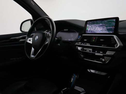 BMW iX3 HIGH EXECUTIVE 80 kWh + TREKHAAK | PANORAMA | 360 CAMERA | ADAPTIVE CRUISE | SFEERVERLICHTING ActivLease financial lease