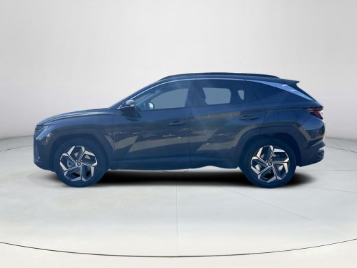 Hyundai Tucson 1.6 T-GDI PHEV Premium Sky 4WD | Panoramisch schuif/kantel dak | Apple Carplay/Android Auto | Sto... ActivLease financial lease