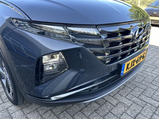 Hyundai Tucson 1.6 T-GDI PHEV Premium Sky 4WD | Panoramisch schuif/kantel dak | Apple Carplay/Android Auto | Sto... ActivLease financial lease