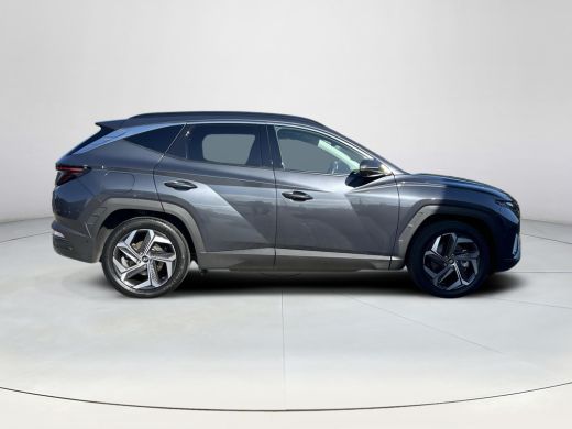 Hyundai Tucson 1.6 T-GDI PHEV Premium Sky 4WD | Panoramisch schuif/kantel dak | Apple Carplay/Android Auto | Sto... ActivLease financial lease