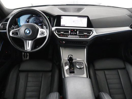 BMW 3 Serie Touring 320e Business Edition Plus M-sport | 84,4% SOH | Panoramadak | Leder | Elektrische trekha... ActivLease financial lease