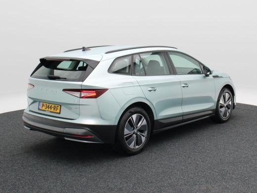 Skoda Enyaq iV 60 180 Pk | Stoel/Stuurverwarming | Adaptive Cruise | Camera | Warmtepomp | Half Leer | CarPlay |... ActivLease financial lease
