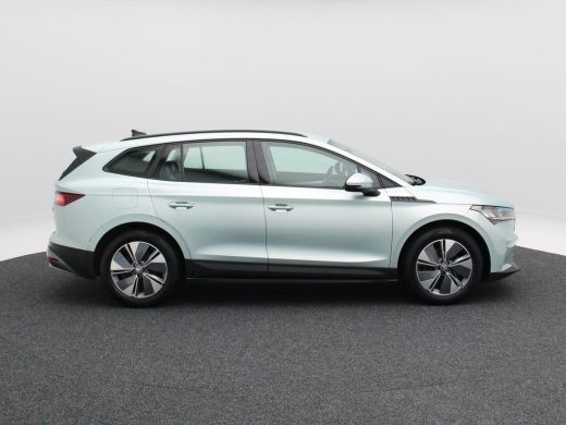 Skoda Enyaq iV 60 180 Pk | Stoel/Stuurverwarming | Adaptive Cruise | Camera | Warmtepomp | Half Leer | CarPlay |... ActivLease financial lease