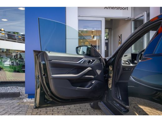 BMW i4 eDrive35 High Executive 70 kWh | M-sport | Cruise adaptief | Camera | Elektrisch bedienbare achte... ActivLease financial lease