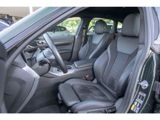 BMW i4 eDrive35 High Executive 70 kWh | M-sport | Cruise adaptief | Camera | Elektrisch bedienbare achte... ActivLease financial lease