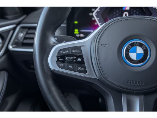 BMW i4 eDrive35 High Executive 70 kWh | M-sport | Cruise adaptief | Camera | Elektrisch bedienbare achte... ActivLease financial lease