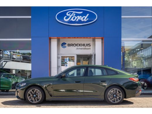 BMW i4 eDrive35 High Executive 70 kWh | M-sport | Cruise adaptief | Camera | Elektrisch bedienbare achte... ActivLease financial lease