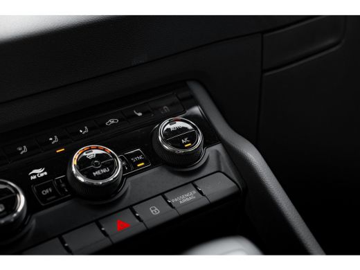 Skoda Karoq 1.5 TSI 7-DSG 150pk Sportline | Navi by App | Keyless | 18" | Stuur & Stoelverwarming | Parkeerhu... ActivLease financial lease