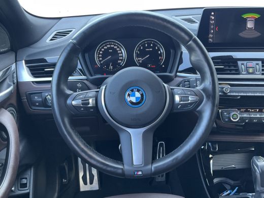 BMW X2 xDrive25e High Executive M-Sport H&K HUD Pano.dak PHEV Sportzetels Plug-in ActivLease financial lease