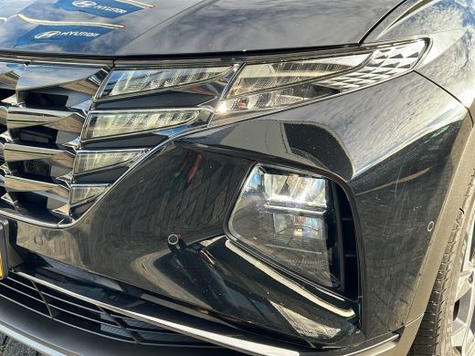 Hyundai Tucson 1.6 T-GDI 265pk PHEV Premium 4WD | Leder | Carplay | Climate | Keyless | Navigatie | Elek. Klep |... ActivLease financial lease