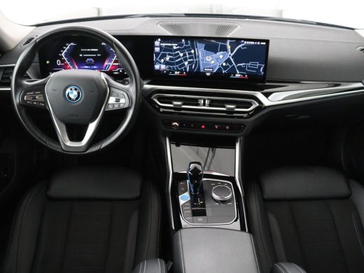 BMW i4 eDrive40 84 kWh | SOH 93,8% | Camera | Adaptive cruise | Climate control | Navigatie | DAB+ | Blu... ActivLease financial lease