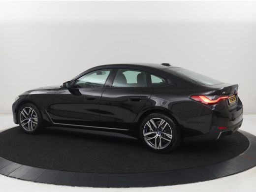 BMW i4 eDrive40 84 kWh | SOH 93,8% | Camera | Adaptive cruise | Climate control | Navigatie | DAB+ | Blu... ActivLease financial lease