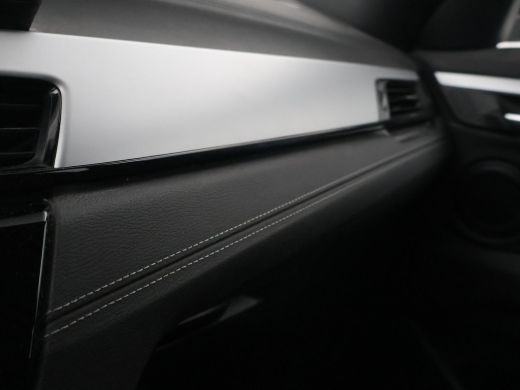 BMW X2 sDrive20i 178 PK AUT. HIGH EXECUTIVE EDITION + TREKHAAK | CAMERA | HEAD-UP | LEDER ActivLease financial lease