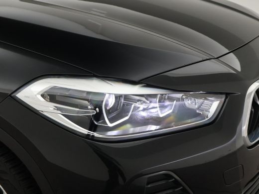 BMW X2 sDrive20i 178 PK AUT. HIGH EXECUTIVE EDITION + TREKHAAK | CAMERA | HEAD-UP | LEDER ActivLease financial lease
