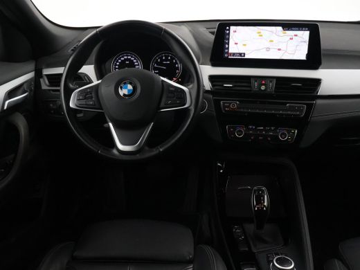 BMW X2 sDrive20i 178 PK AUT. HIGH EXECUTIVE EDITION + TREKHAAK | CAMERA | HEAD-UP | LEDER ActivLease financial lease