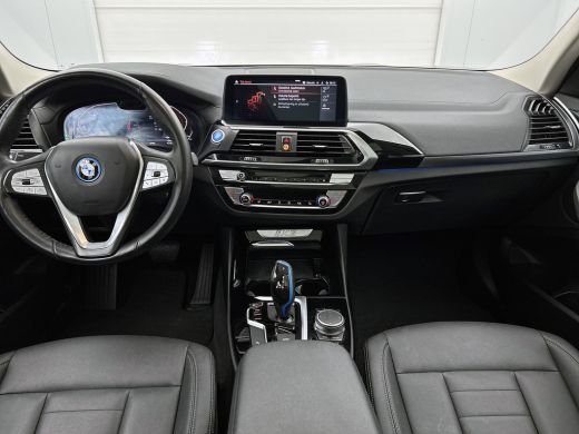 BMW iX3 Executive 80 kWh-SOH 97.46% / Panoramadak / Trekhaak / Leder / Stoelverwarming / Pdc.+Camera / Na... ActivLease financial lease