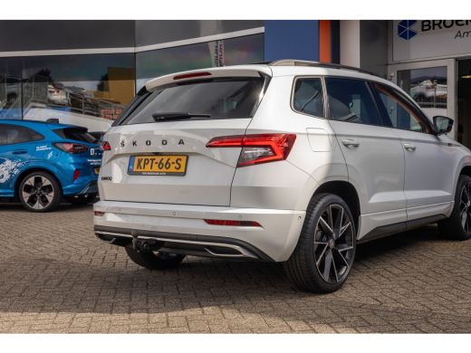 Skoda Karoq 1.5 TSI ACT Sportline Business | Trekhaak (weg-klap) | Pano-dak | 360 camera | Adap.cruise | Prem... ActivLease financial lease