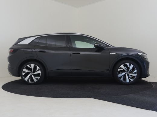 Volkswagen ID.4 First 77 kWh l 1e eigenaar l Dealeronderhoud l Warmtepomp l Stoelverwarming l Camera l Elektr. Tr... ActivLease financial lease
