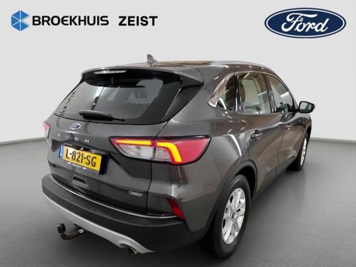 Ford Kuga 2.5 PHEV Titanium | 100% dealer o.h. | Trekhaak | Adaptieve cruise | Standkachel | Parkeercamera ... ActivLease financial lease