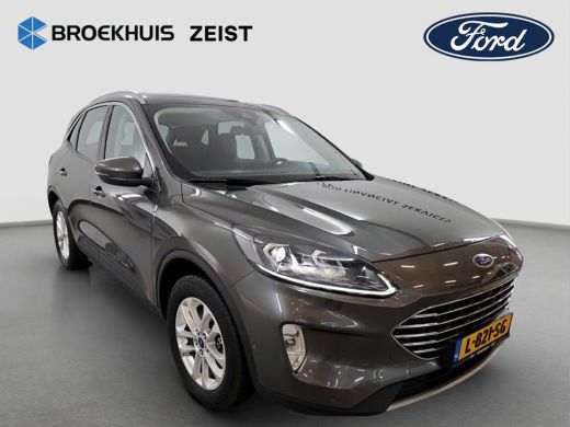 Ford Kuga 2.5 PHEV Titanium | 100% dealer o.h. | Trekhaak | Adaptieve cruise | Standkachel | Parkeercamera ... ActivLease financial lease
