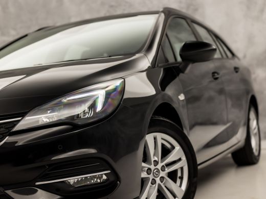 Opel Astra Sports Tourer 1.2 Sport (APPLE CARPLAY, CAMERA, TREKHAAK, SPORTSTOELEN, PARKEERSENSOREN, CRUISE, ... ActivLease financial lease
