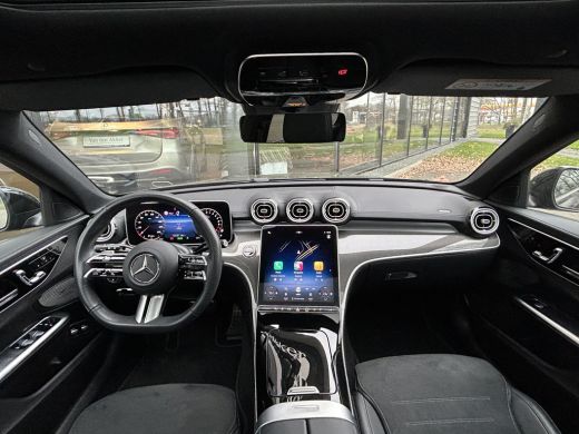 Mercedes-Benz C-Klasse 300e AMG Estate // Trekhaak // Panoramadak // Distronic // 360 Camera // Memory // Sfeerverlichting ActivLease financial lease