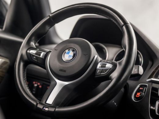 BMW 1 Serie 118i M Sport High Executive Automaat (GROOT NAVI, M PAKKET, LEDER, STOELVERWARMING, SPORTSTOELEN,... ActivLease financial lease