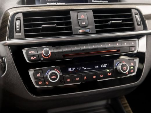 BMW 1 Serie 118i M Sport High Executive Automaat (GROOT NAVI, M PAKKET, LEDER, STOELVERWARMING, SPORTSTOELEN,... ActivLease financial lease