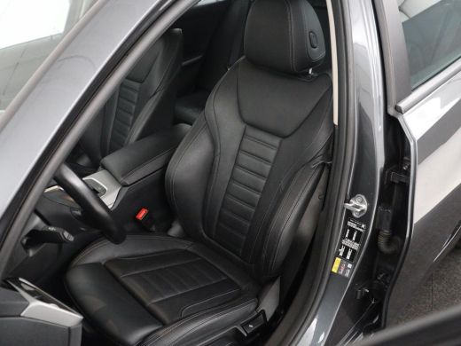 BMW 3 Serie Touring 320e Business Edition Plus | SOH 90% | Leder | Stoelverwarming | Carplay | Cruise control... ActivLease financial lease