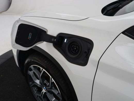 BMW X1 xDrive25e High Executive | SOH 85,2% | Half leder | Adaptive cruise | Stoelverwarming | Climate c... ActivLease financial lease