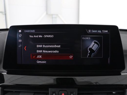 BMW X1 xDrive25e High Executive | SOH 85,2% | Half leder | Adaptive cruise | Stoelverwarming | Climate c... ActivLease financial lease