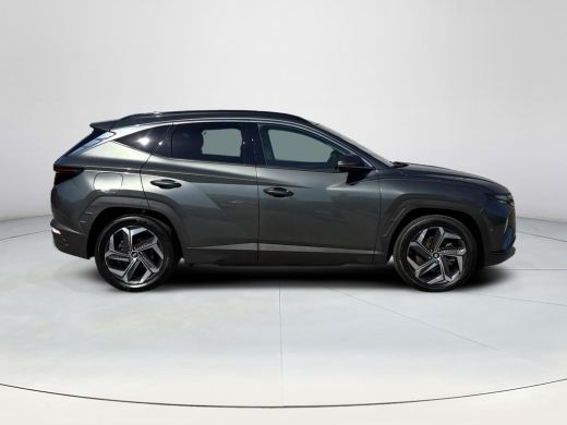 Hyundai Tucson 1.6 T-GDI PHEV Premium Sky 4WD | Panoramisch schuif/kantel dak | Apple Carplay/Android Auto | Sto... ActivLease financial lease