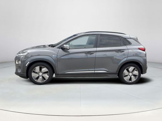 Hyundai Kona EV Premium 64 kWh | SOH 100% | Warmtepomp  | Leder | Rijklaarprijs! ActivLease financial lease
