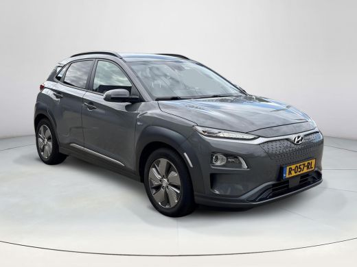 Hyundai Kona EV Premium 64 kWh | SOH 100% | Warmtepomp  | Leder | Rijklaarprijs! ActivLease financial lease