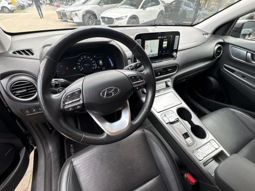 Hyundai Kona EV Premium 64 kWh | SOH 100% | Warmtepomp  | Leder | Rijklaarprijs! ActivLease financial lease
