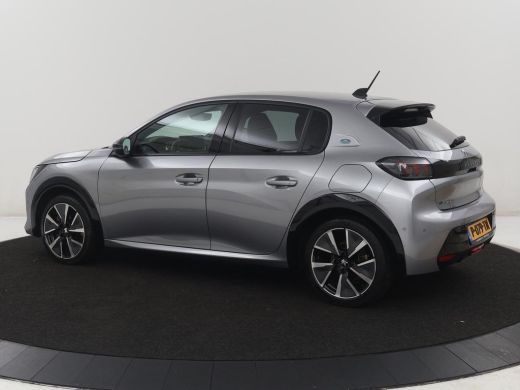 Peugeot e-208 | SOH 92,2% | Half leder | Stoelverwarming | Navigatie | Climate control | Carplay | Camera | Par... ActivLease financial lease